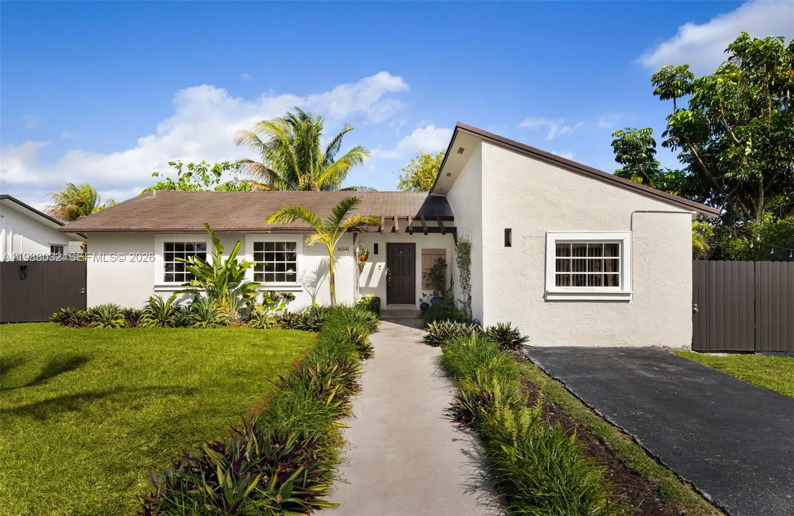 4 bedroom 2 bath for sale at 16341 SW 104th Ave, Miami FL 33157