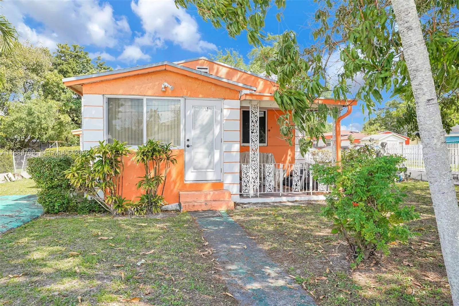 3 bedroom 2 bath for sale at 1451 NW 43rd St, Miami FL 33142