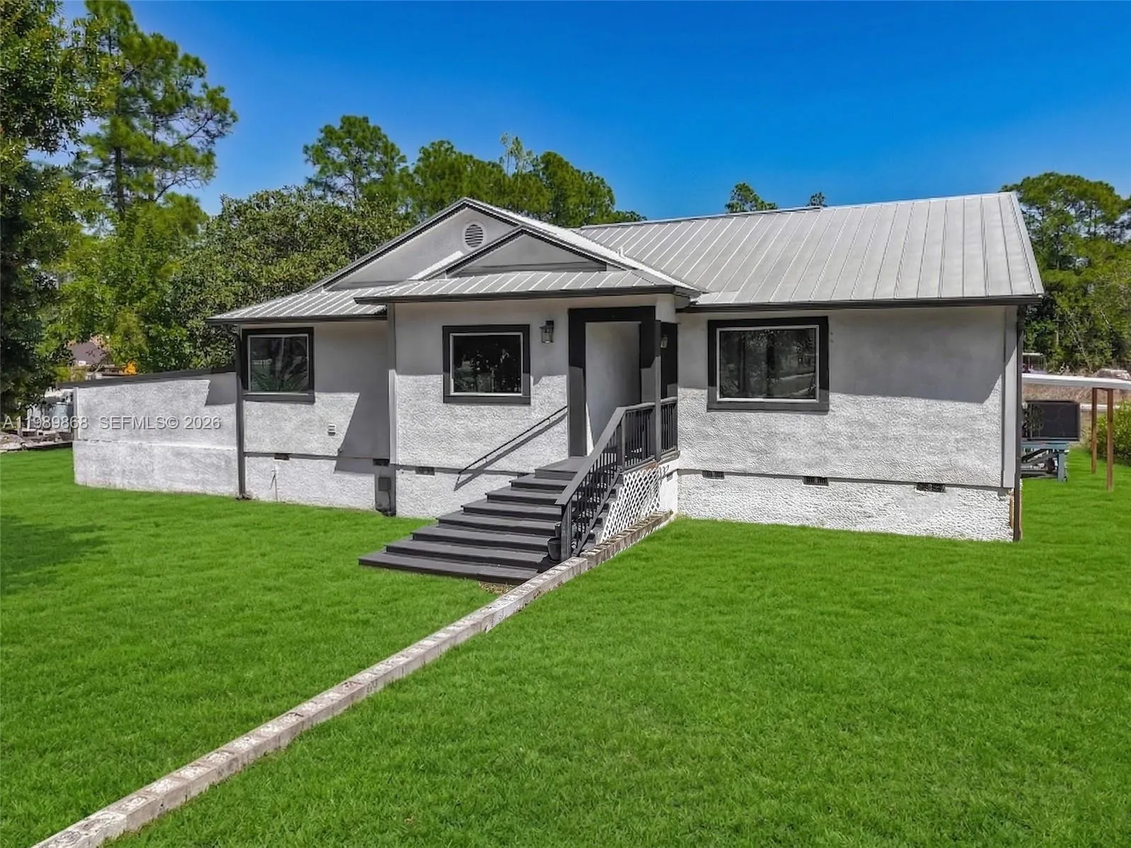 3 bedroom 2 bath for sale at 310 14th Street SE, Naples FL 34117