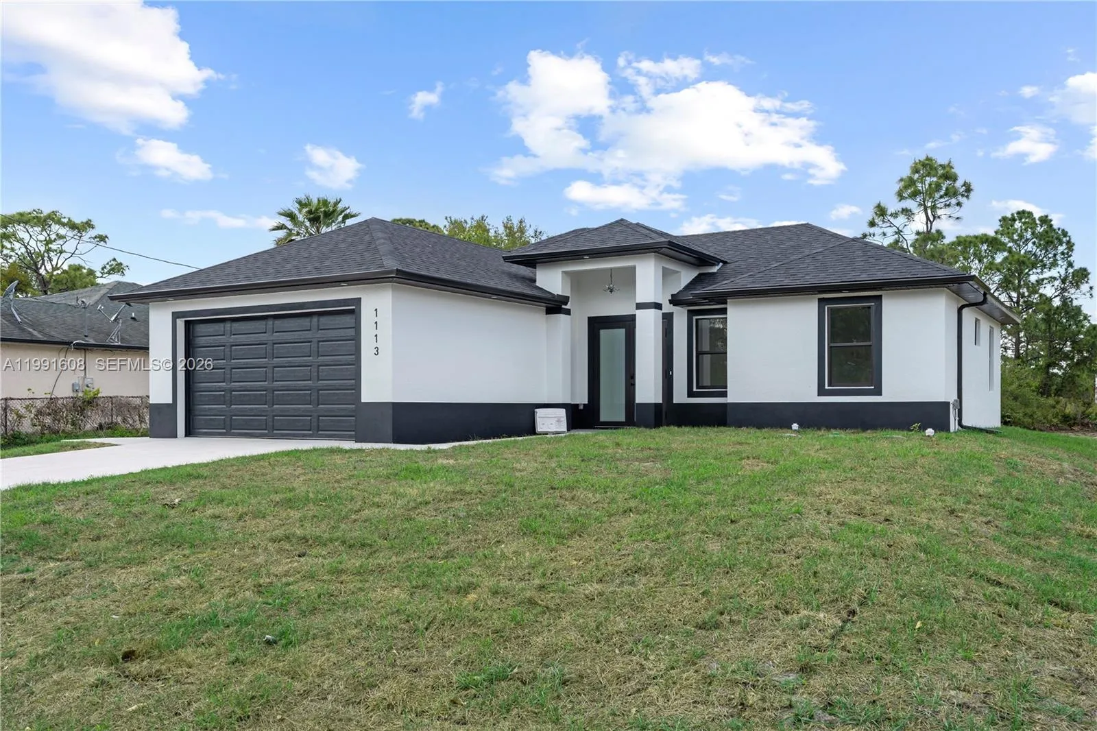 3 bedroom 3 bath for sale at 1113 ENRIQUE ST E, Lehigh Acres FL 33974