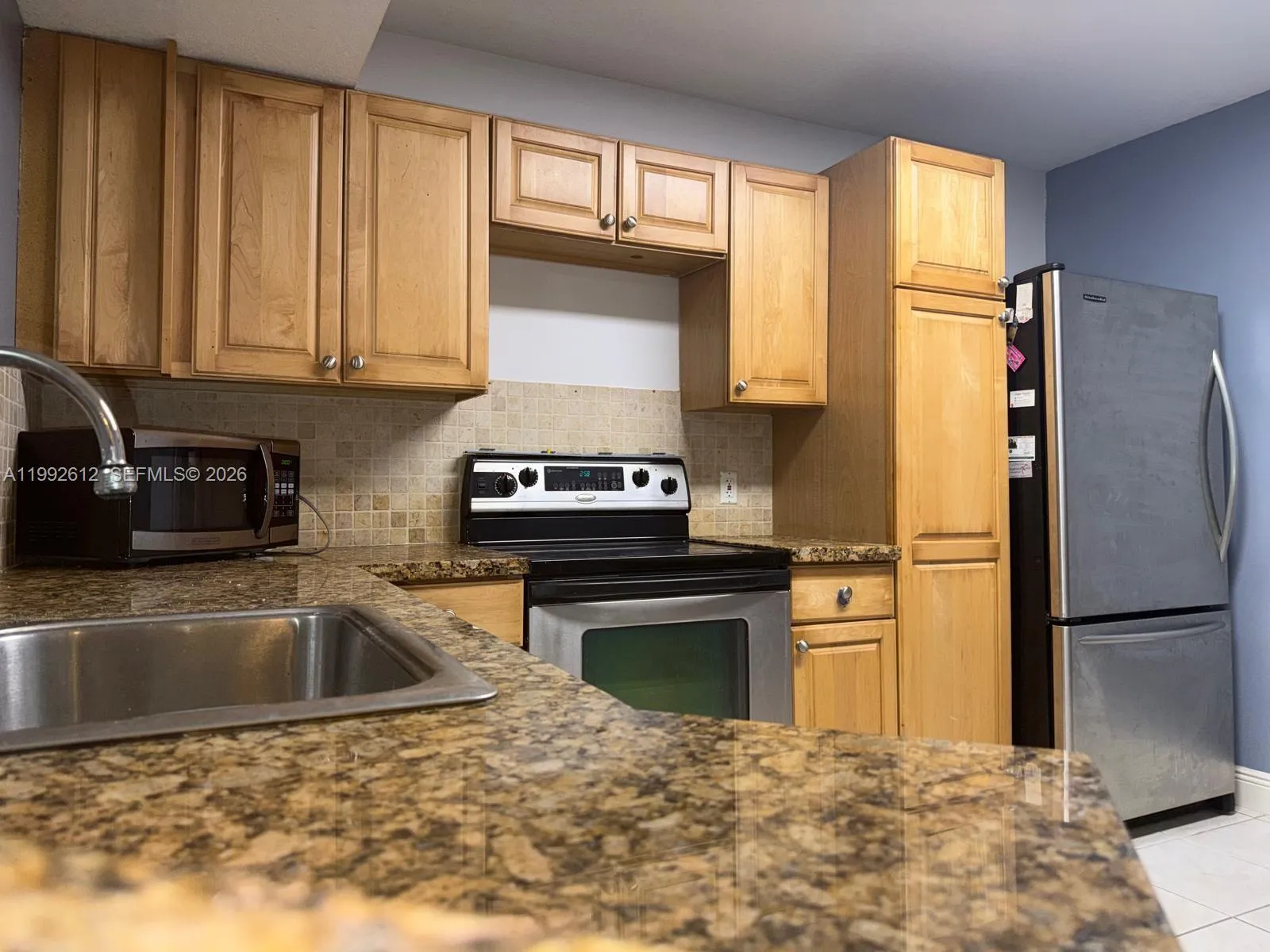 2 bedroom 2 bath for sale at 8901 Wiles Rd # 103, Coral Springs FL 33067