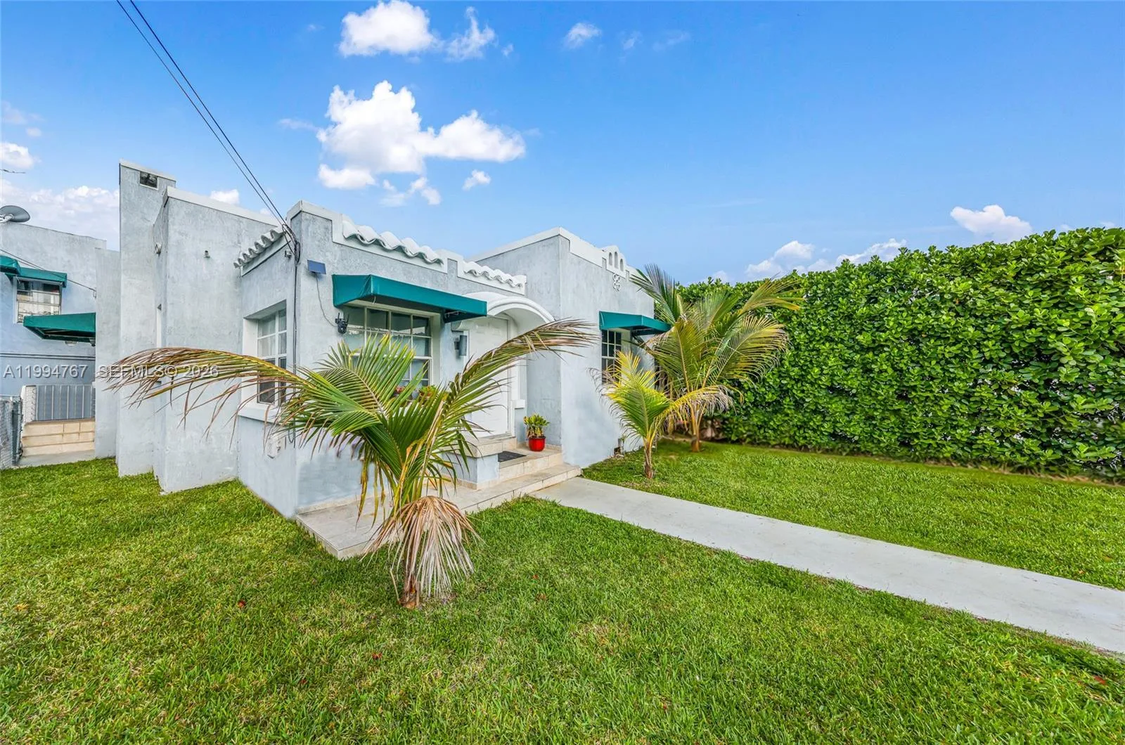 330 NW 25th Ave, Miami FL 33125