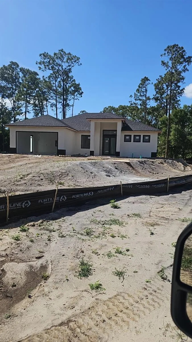 4 bedroom 2 bath for sale at 1207 Ramus St East, Lehigh Acres FL 33974