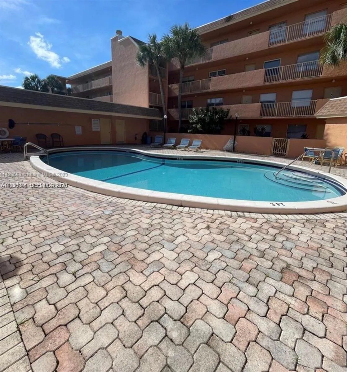 3100 N Pine Island Rd # 103, Sunrise FL 33351