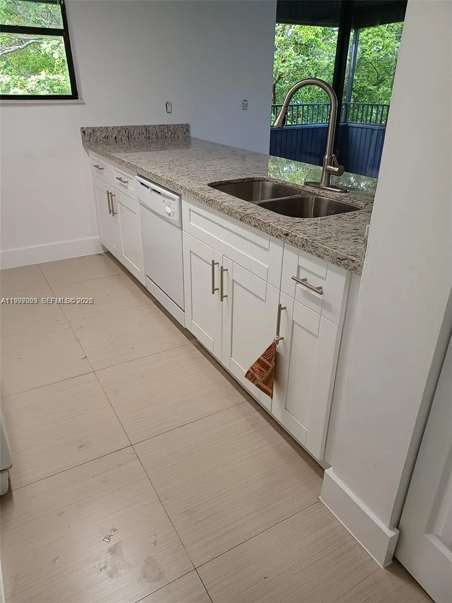 16220 NW 2nd Ave # 411, Miami FL 33169