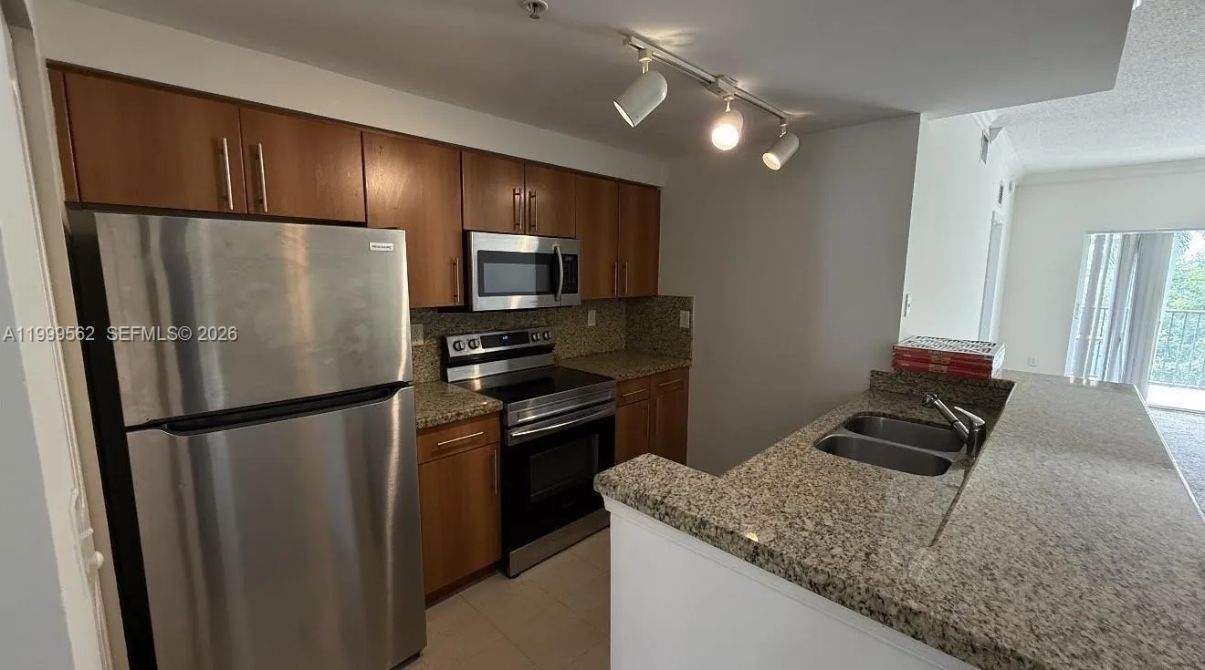 5800 W Sample Rd # 307, Coral Springs FL 33067