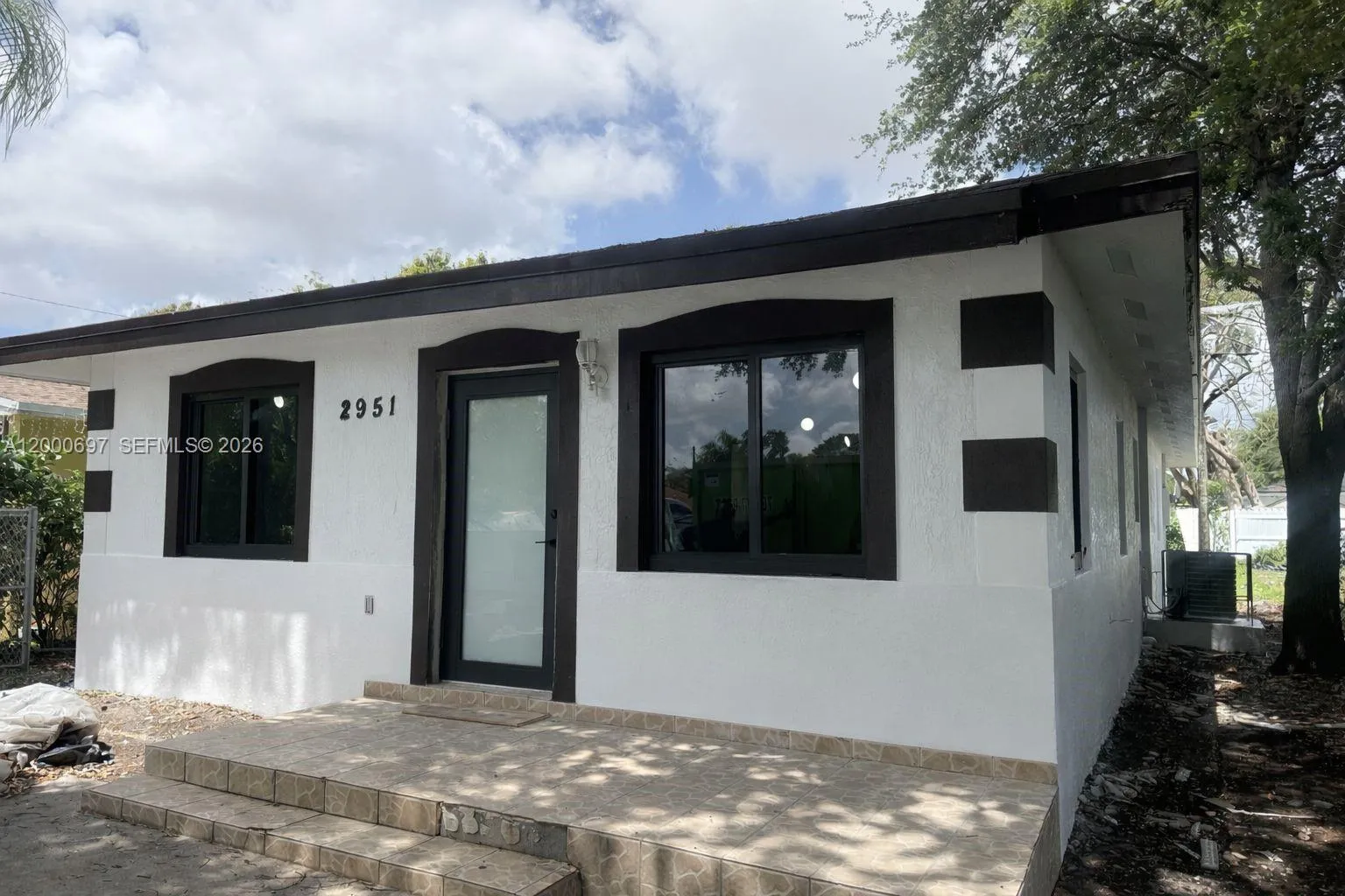 3 bedroom 2 bath for sale at 2951 NW 57th St, Miami FL 33142