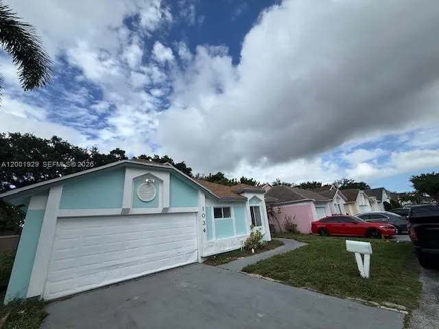 1034 W Jasmine Ln, North Lauderdale FL 33068