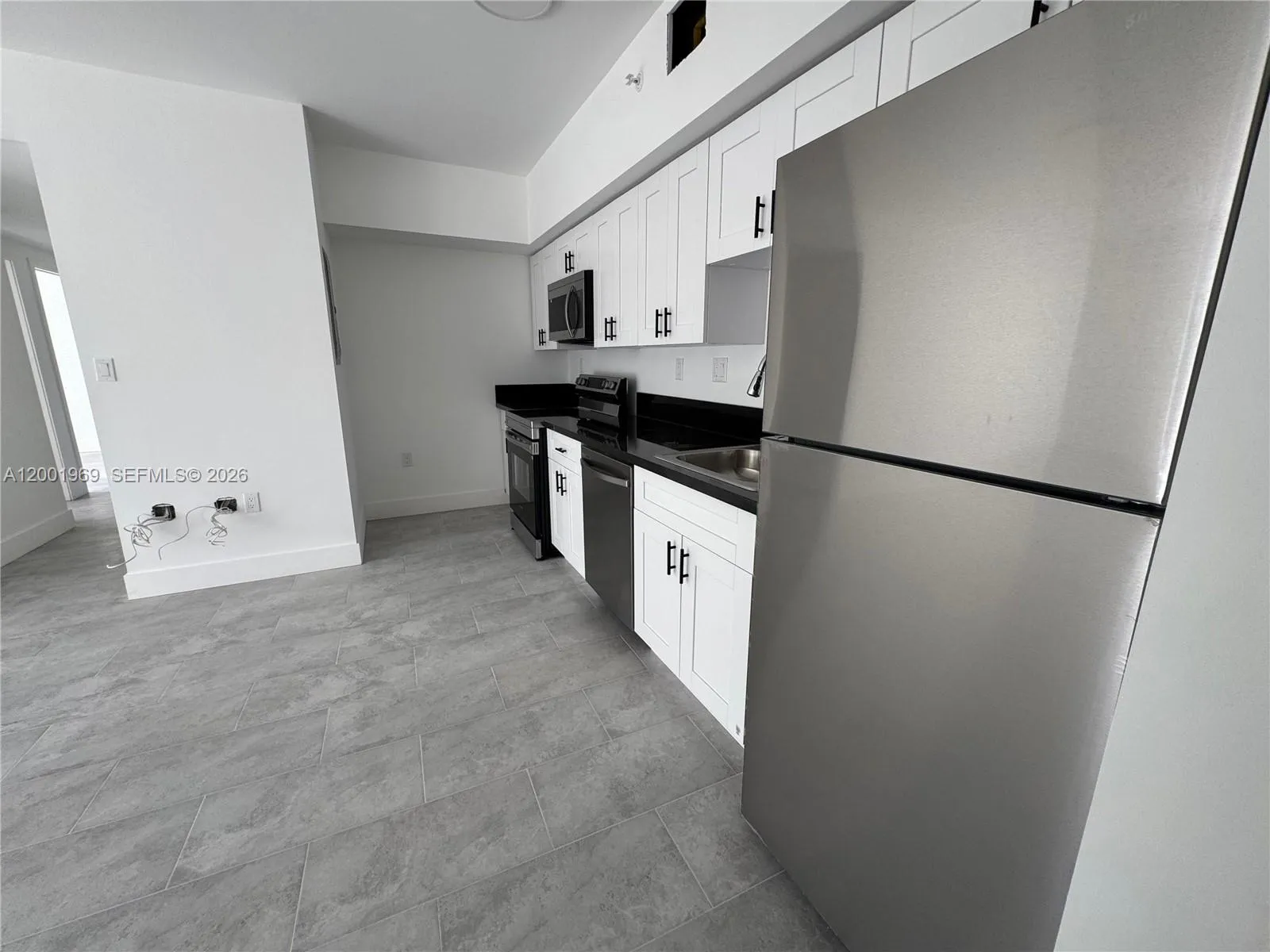 147 NW 59th St # 303, Miami FL 33127