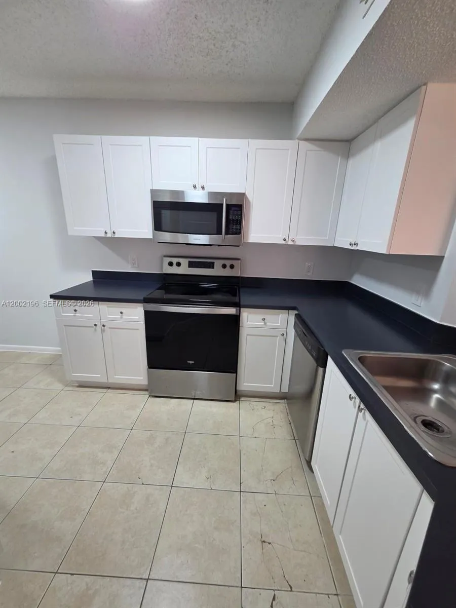 8871 Wiles Rd # 208, Coral Springs FL 33067