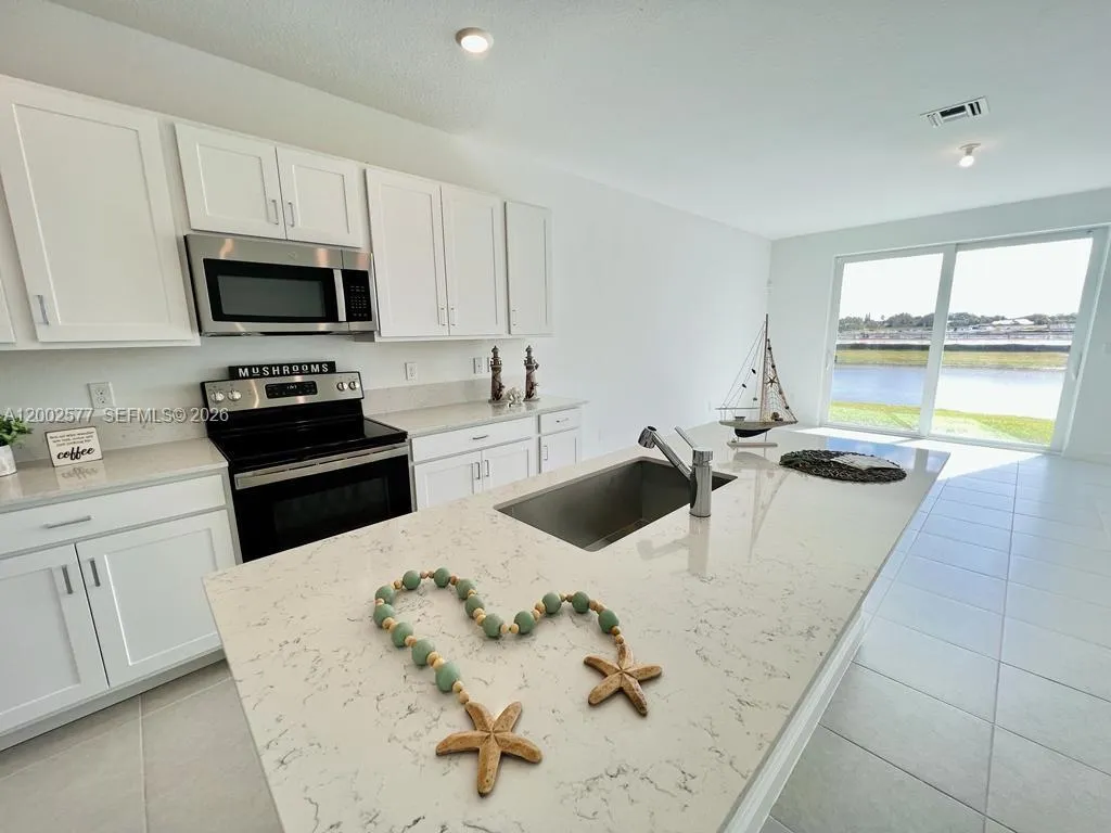 212 SE Woodbark St, Port St. Lucie FL 34984