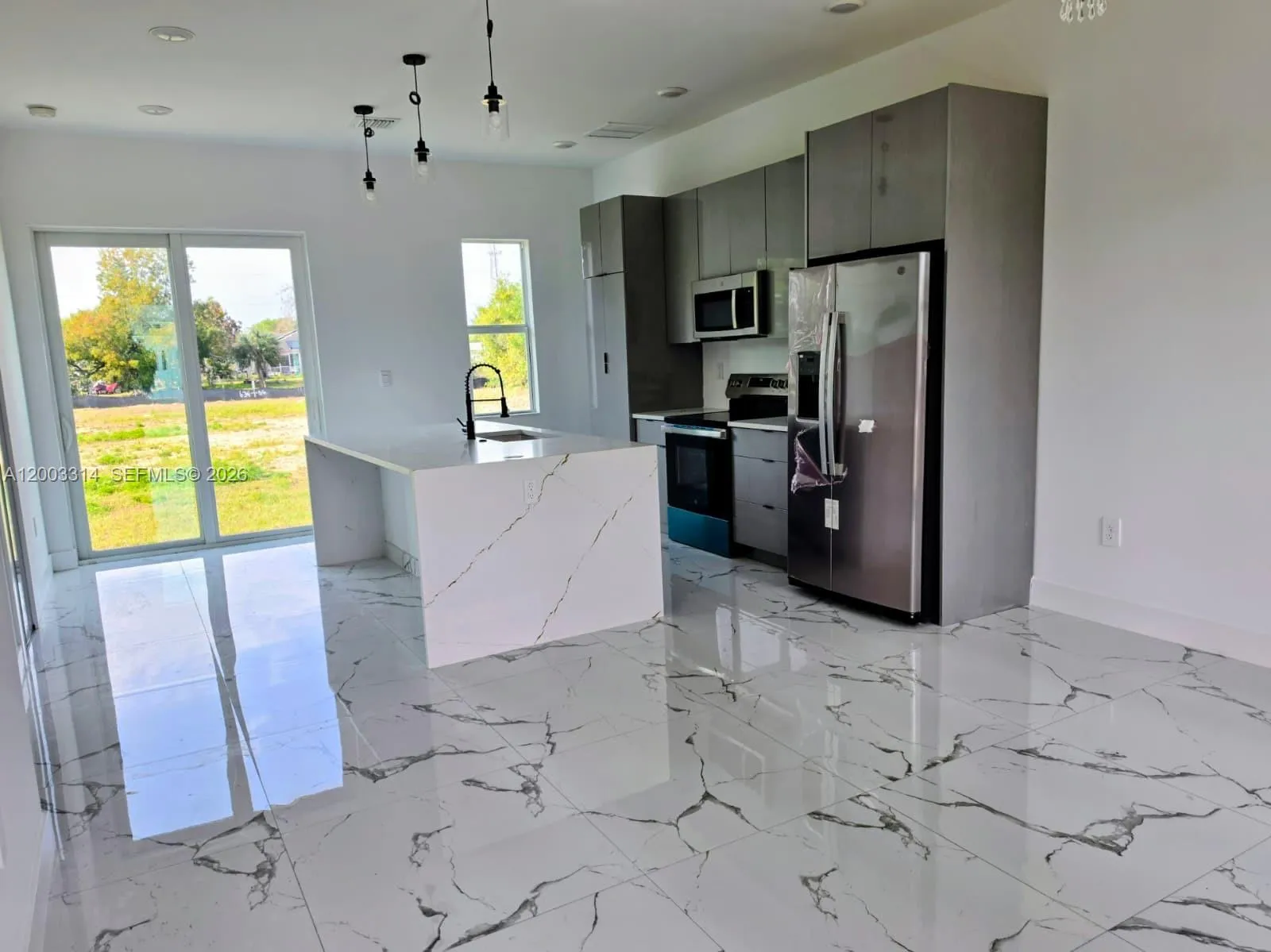 402 Harrison Dr, Lehigh Acres FL 33936