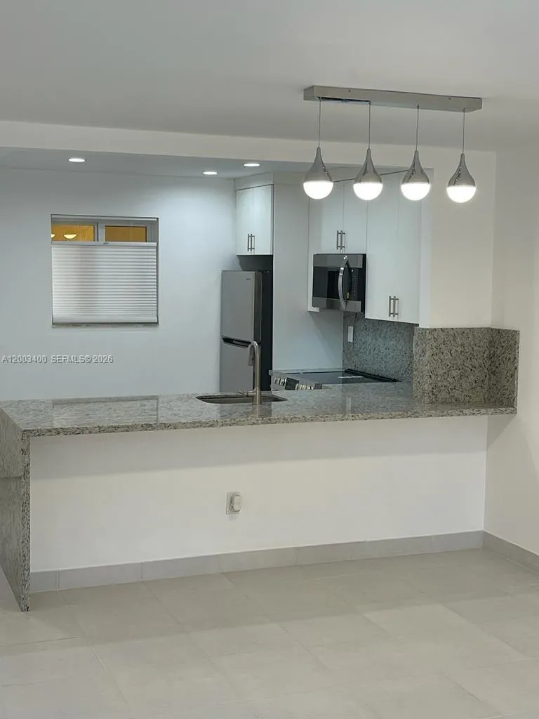 7732 Camino Real # 318, Miami FL 33143