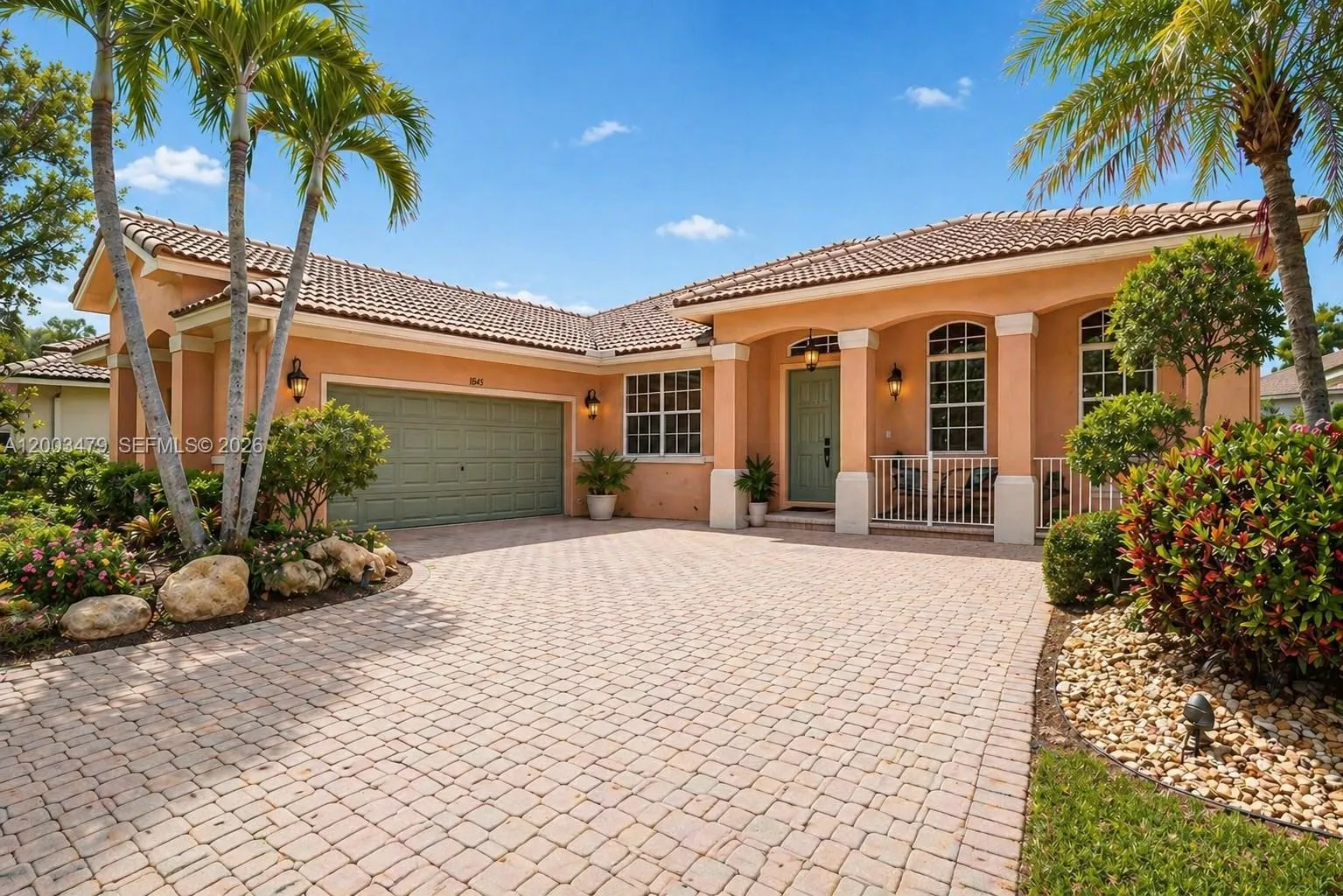 4 bedroom 2 bath for sale at 1169 Peregrine Way, Weston FL 33327