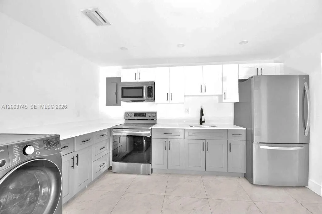 1102 NW 103rd St # 1, Miami FL 33150