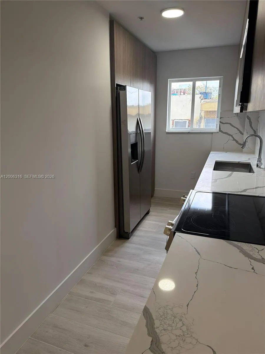 32 NW 14th Ave # 203, Miami FL 33125