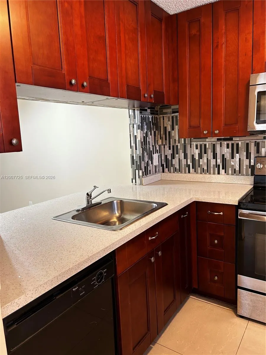 713 NW 103rd Ter # 203, Pembroke Pines FL 33026