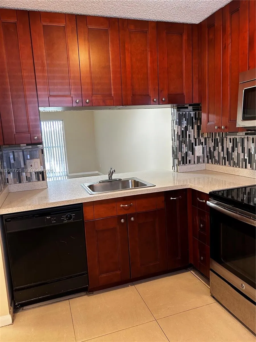 713 NW 103rd Ter # 203, Pembroke Pines FL 33026