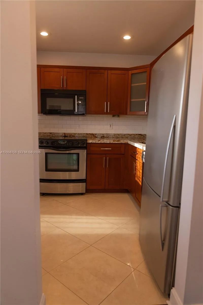 7703 Camino Real # 406, Miami FL 33143