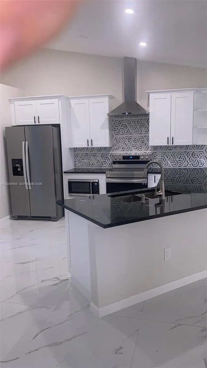 1198 SW Ingrassina Ave, Port St. Lucie FL 34953
