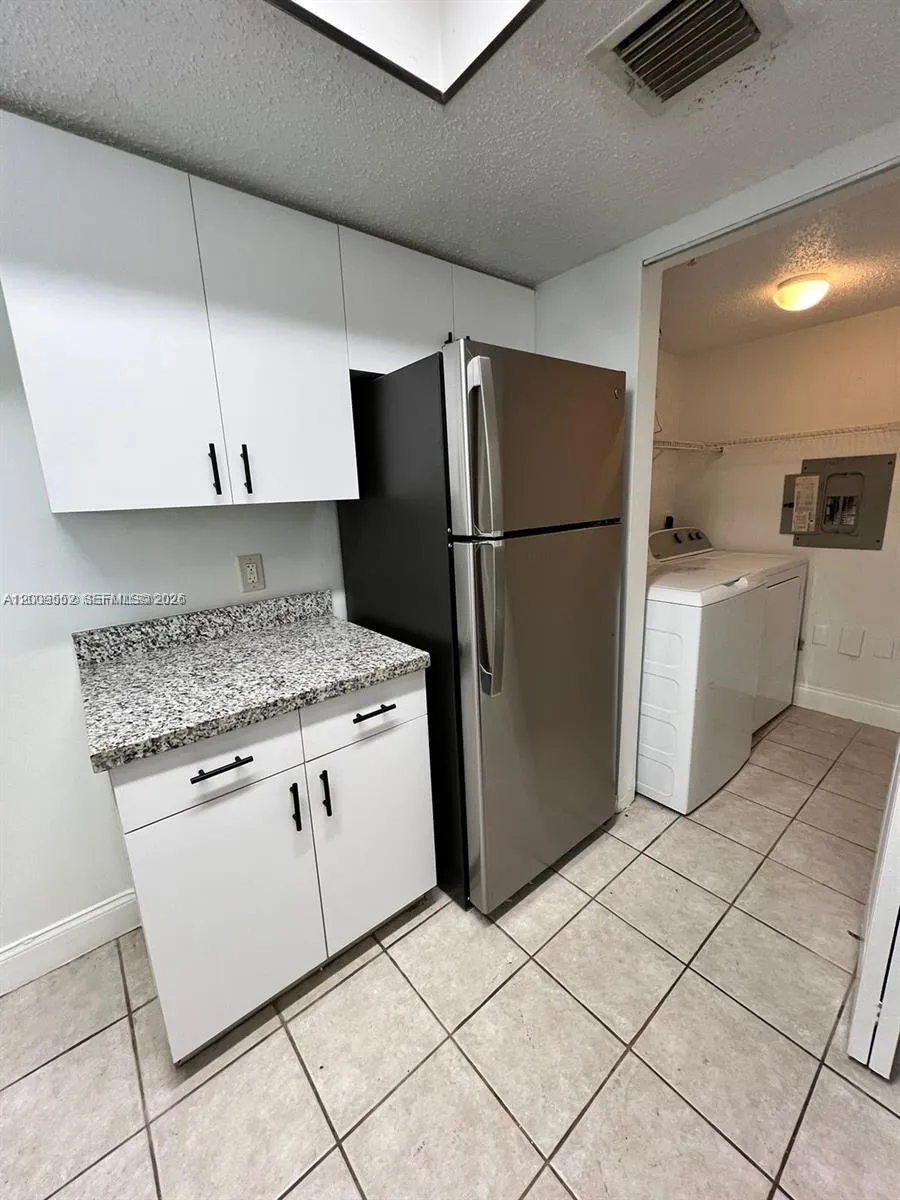 5065 Wiles Rd # 103, Coconut Creek FL 33073