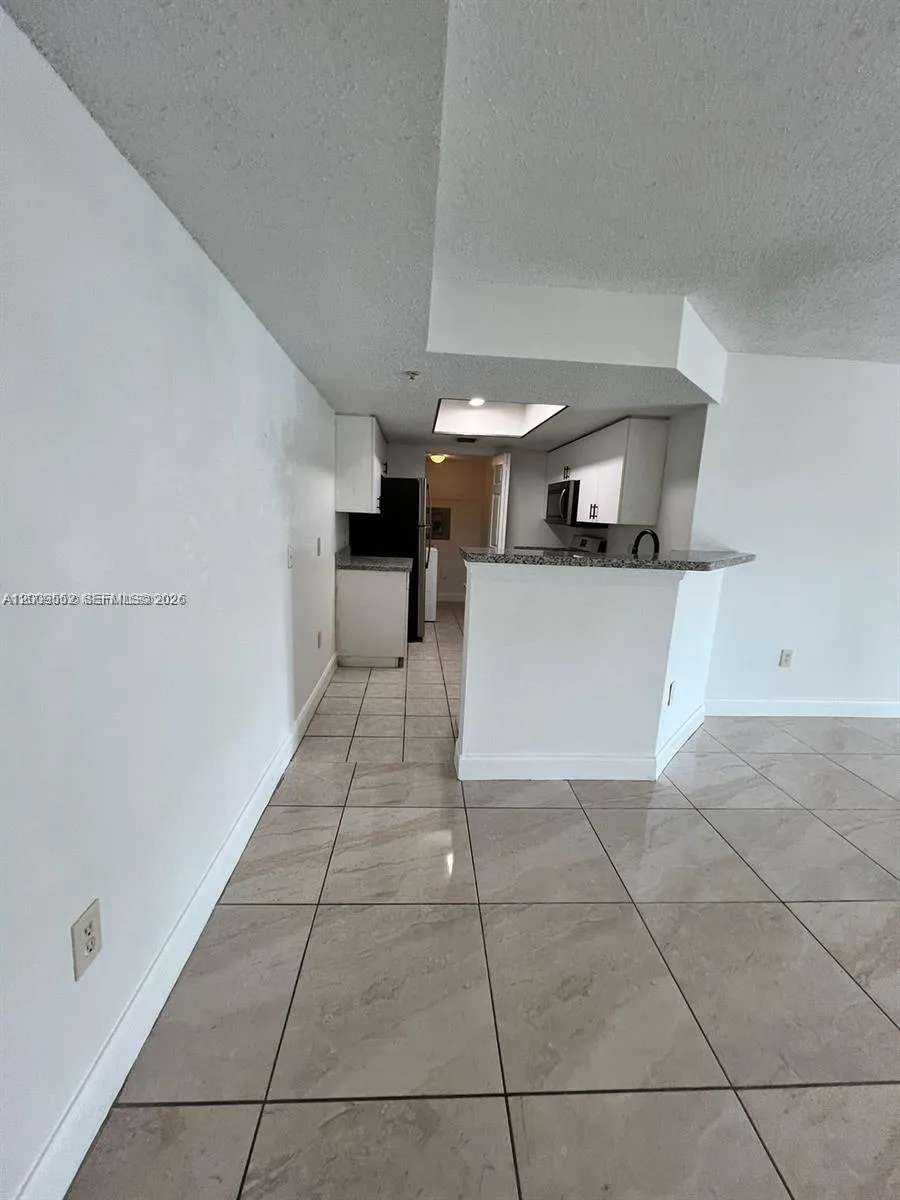 5065 Wiles Rd # 103, Coconut Creek FL 33073