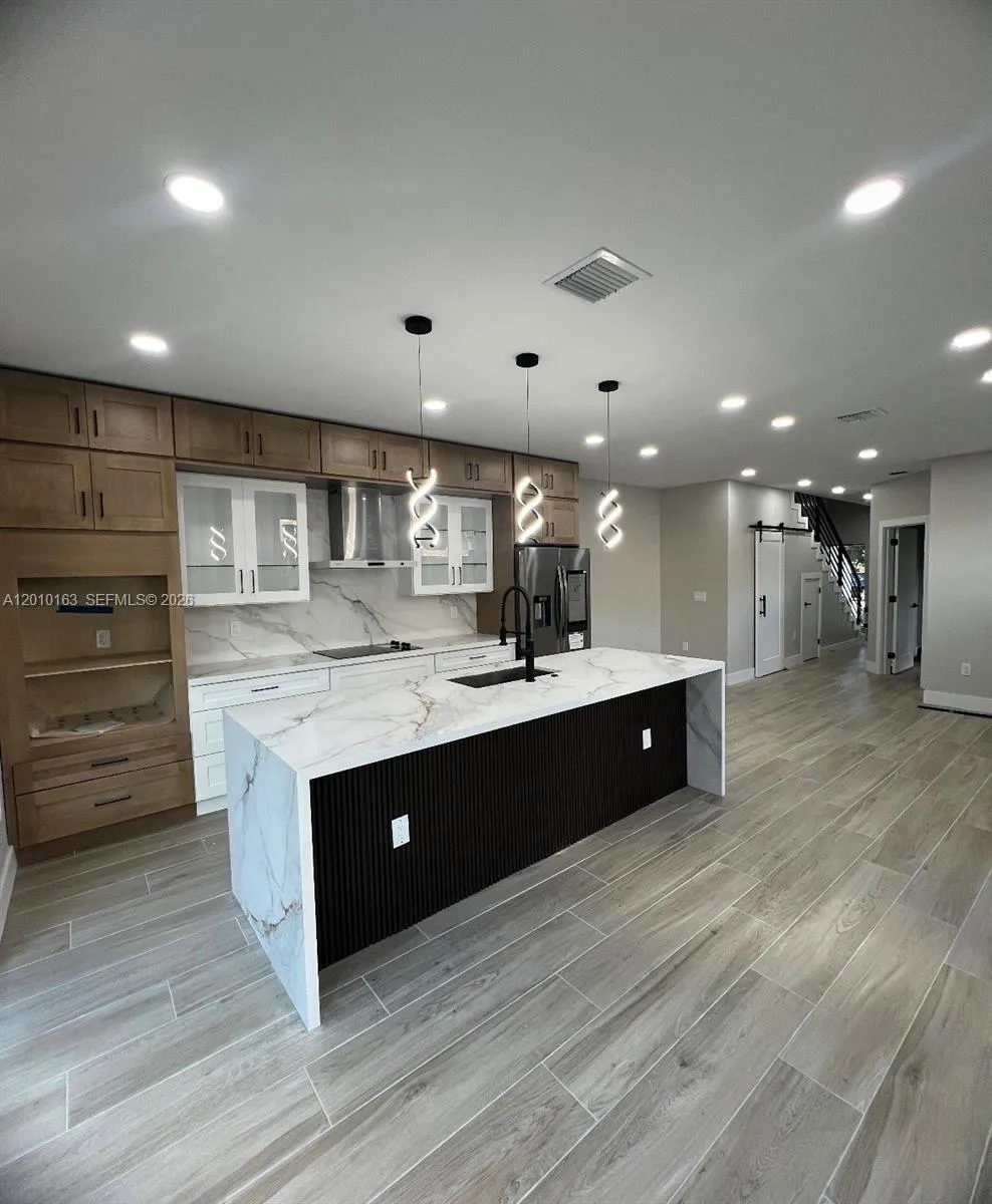 1818 NW 49 st, Miami FL 33142