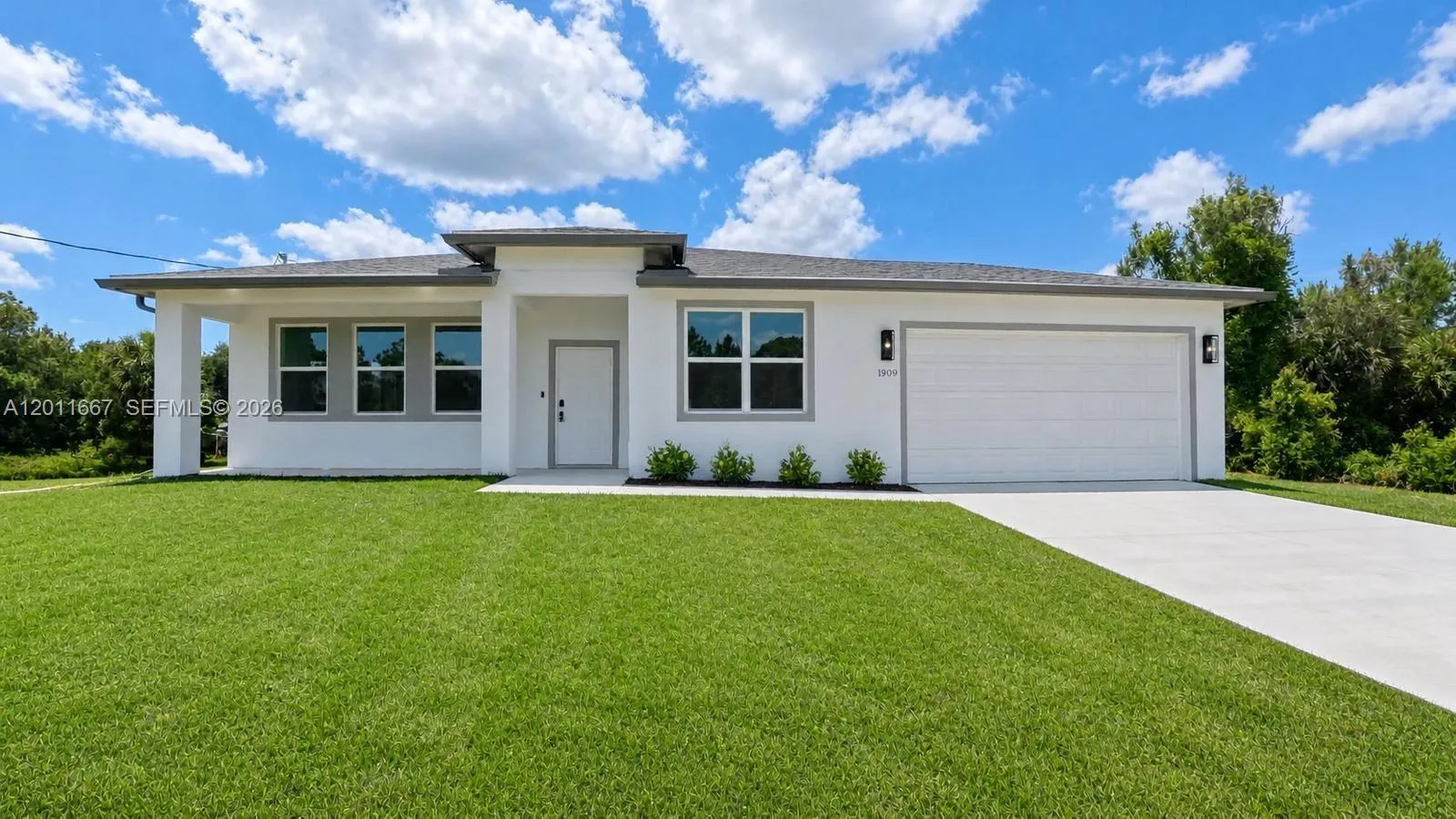 1909 Moore Ave, Lehigh Acres FL 33972