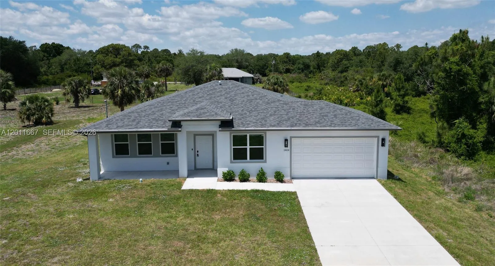 1909 Moore Ave, Lehigh Acres FL 33972