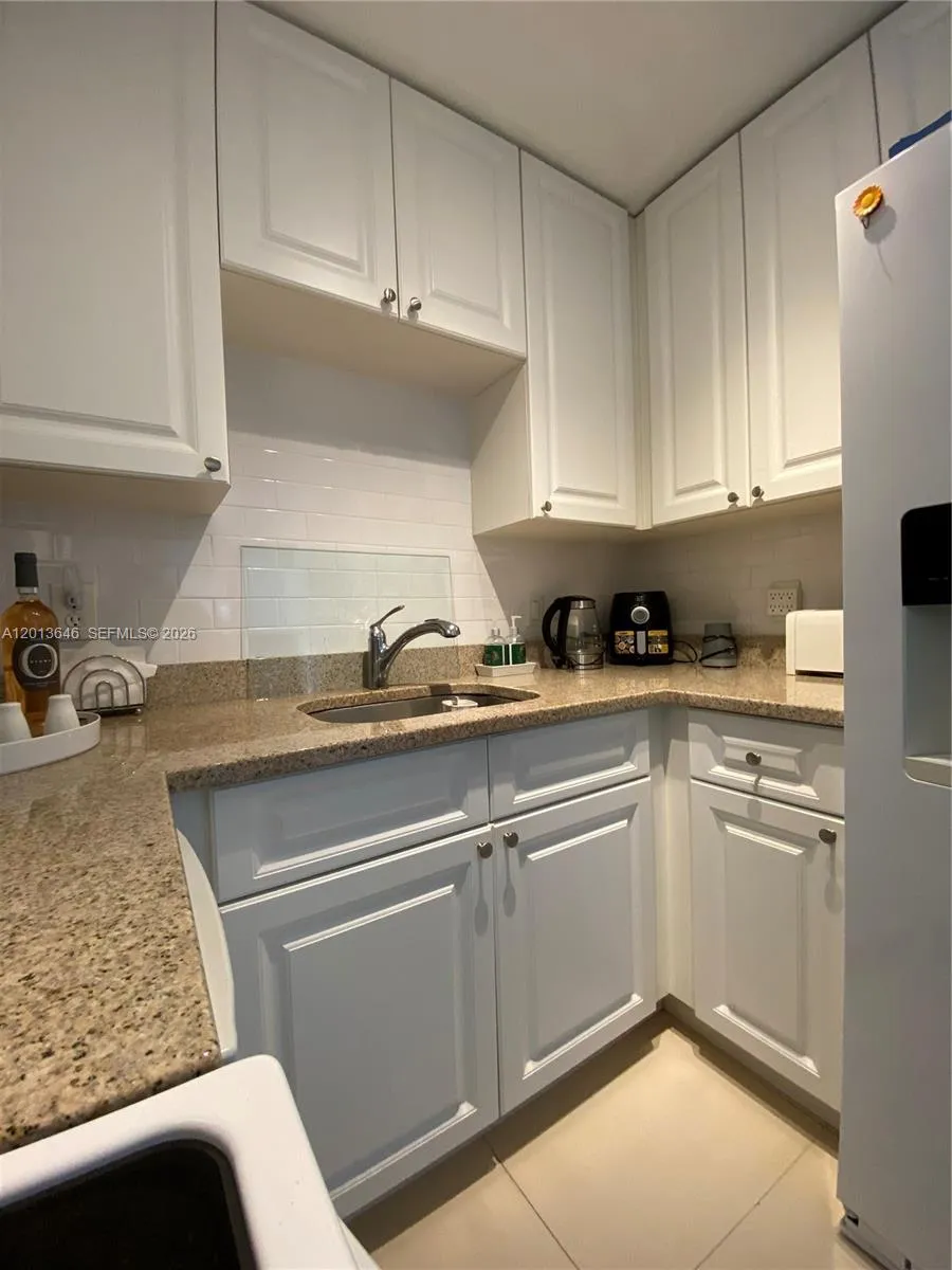 5050 NW 7th St # 312, Miami FL 33126