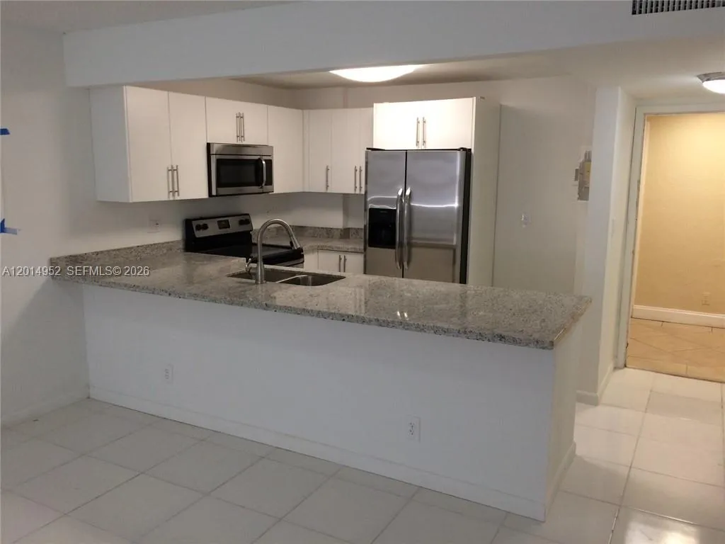 9143 SW 77 AV # B107, Miami FL 33156