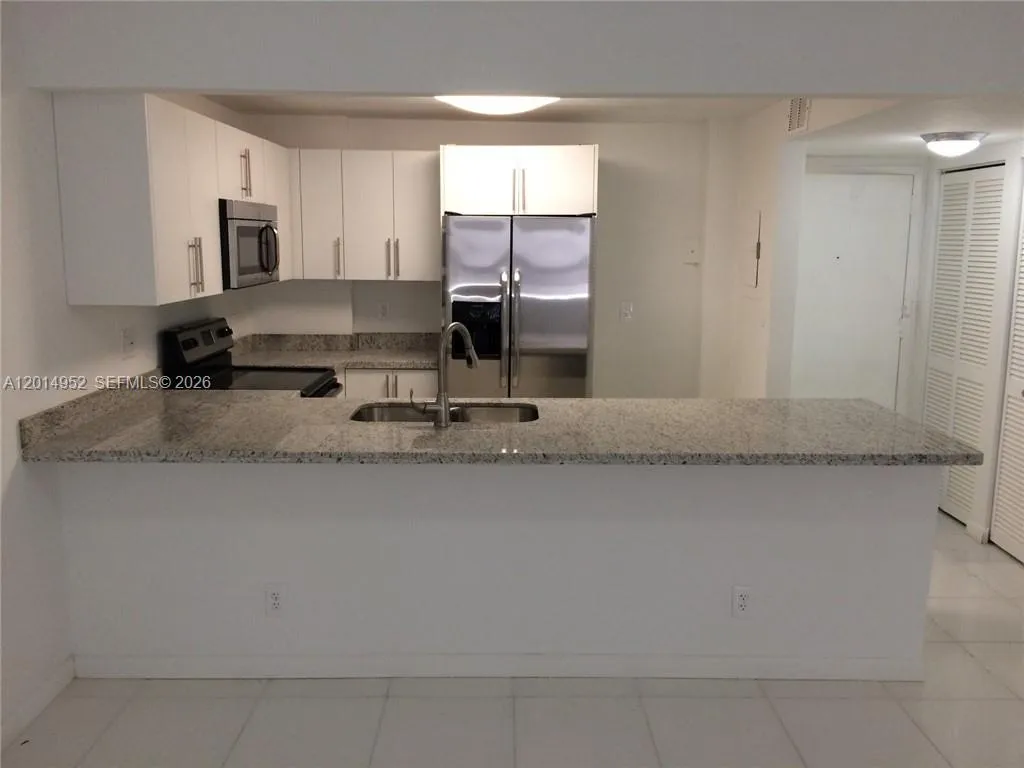 9143 SW 77 AV # B107, Miami FL 33156