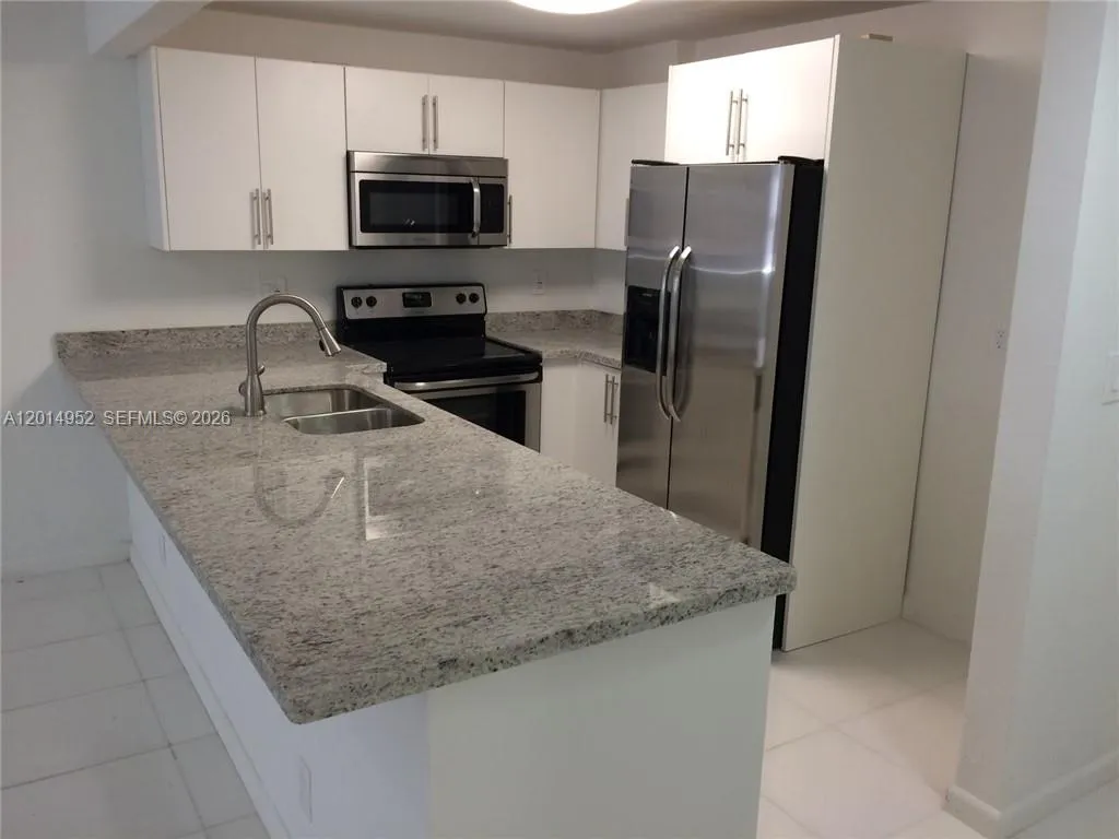 9143 SW 77 AV # B107, Miami FL 33156