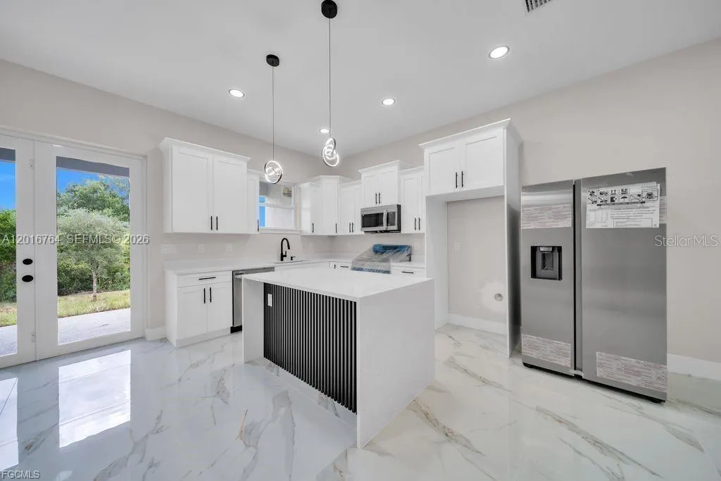 225/227 Homer Ave S, Lehigh Acres FL 33973