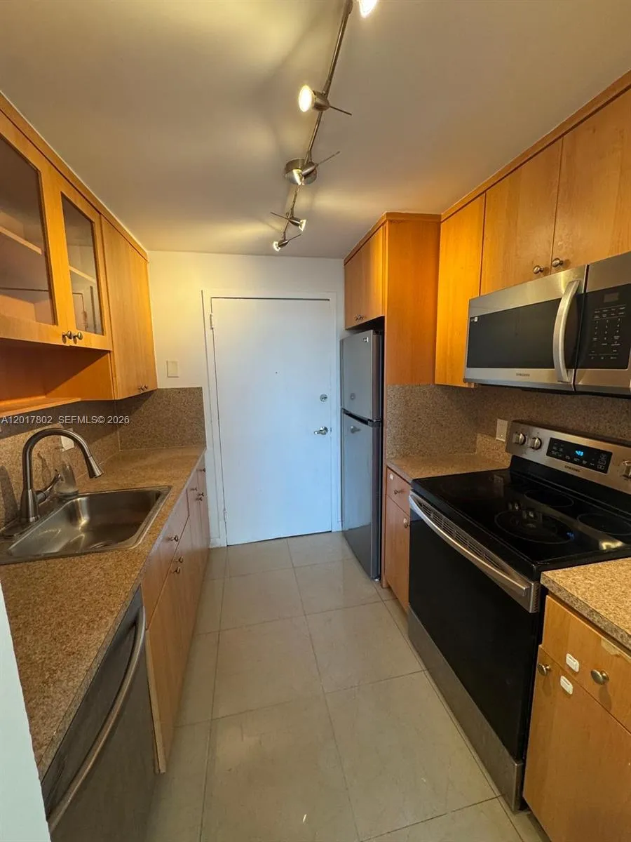 2020 NE 135th St # 303, North Miami FL 33181