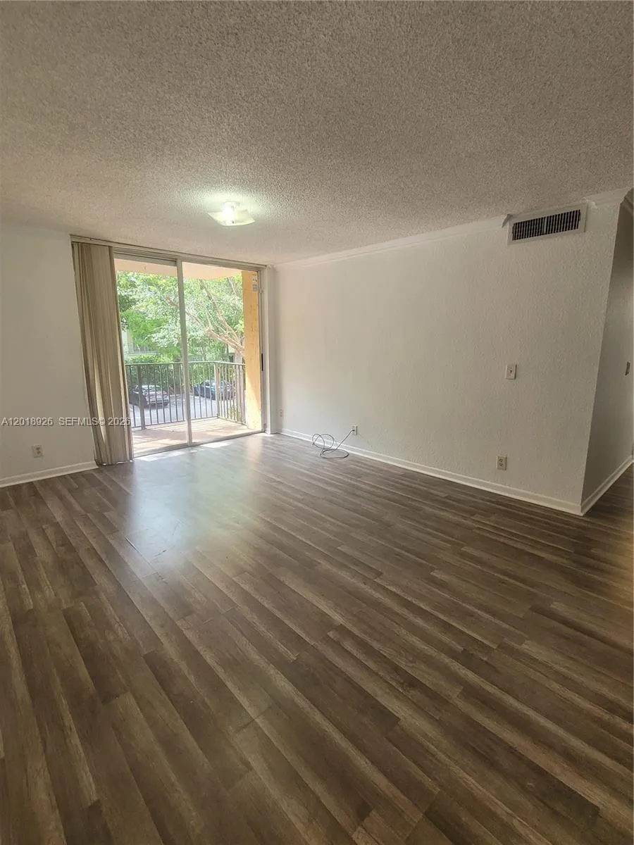 2 bedroom 2 bath for sale at 10773 Cleary Blvd # 203, Plantation FL 33324