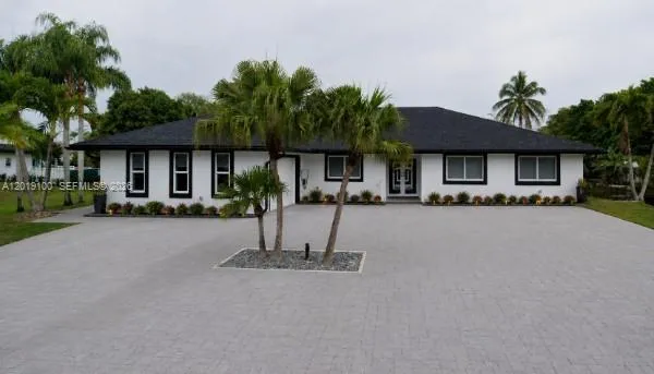 4 bedroom 3 bath for sale at 11701 SW 21st Ct, Davie FL 33325