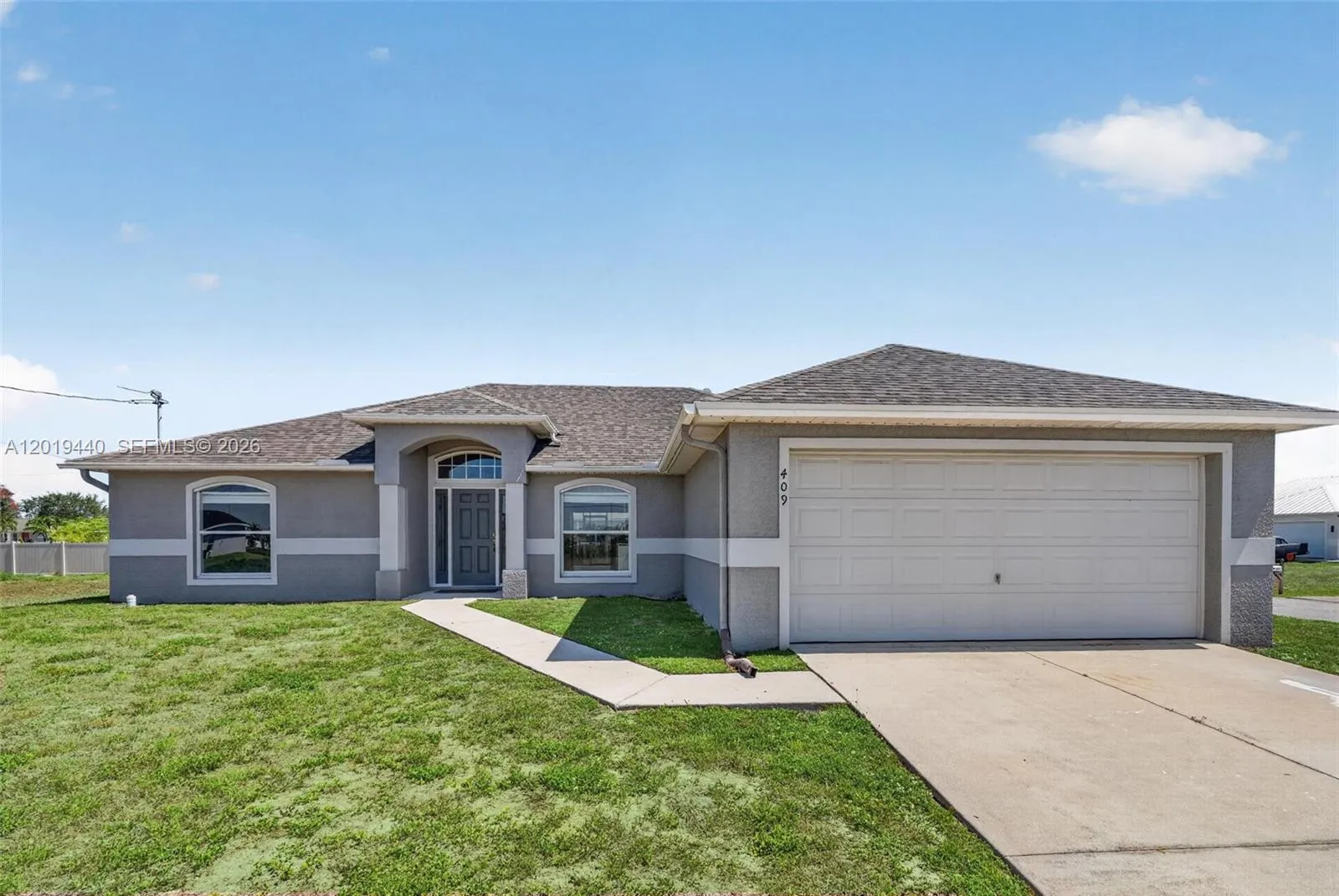 4 bedroom 2 bath for sale at 409 NE 25th Ter, Cape Coral FL 33909