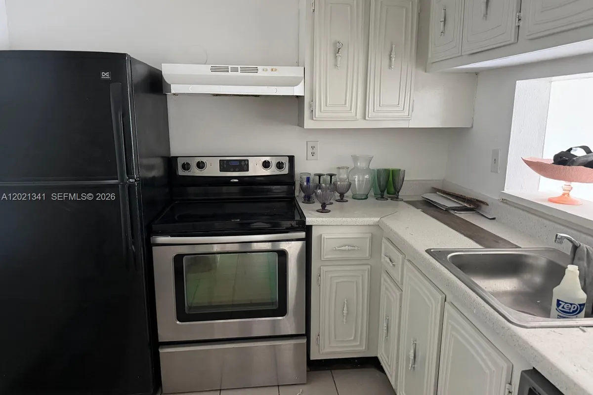 492 NW 165th St Rd # 209, Miami FL 33169