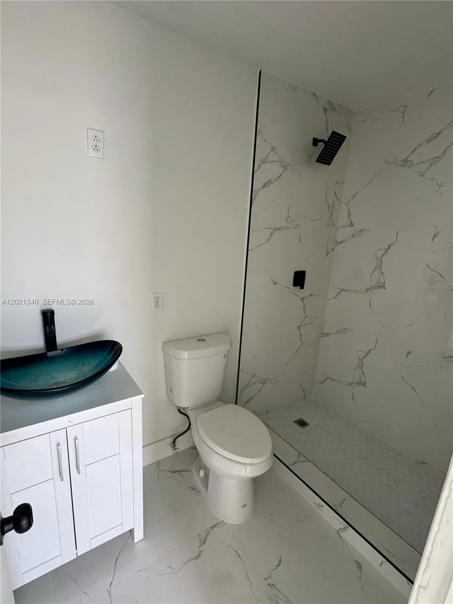 4 bedroom 3 bath for sale at 3070 NW 97th St, Miami FL 33147