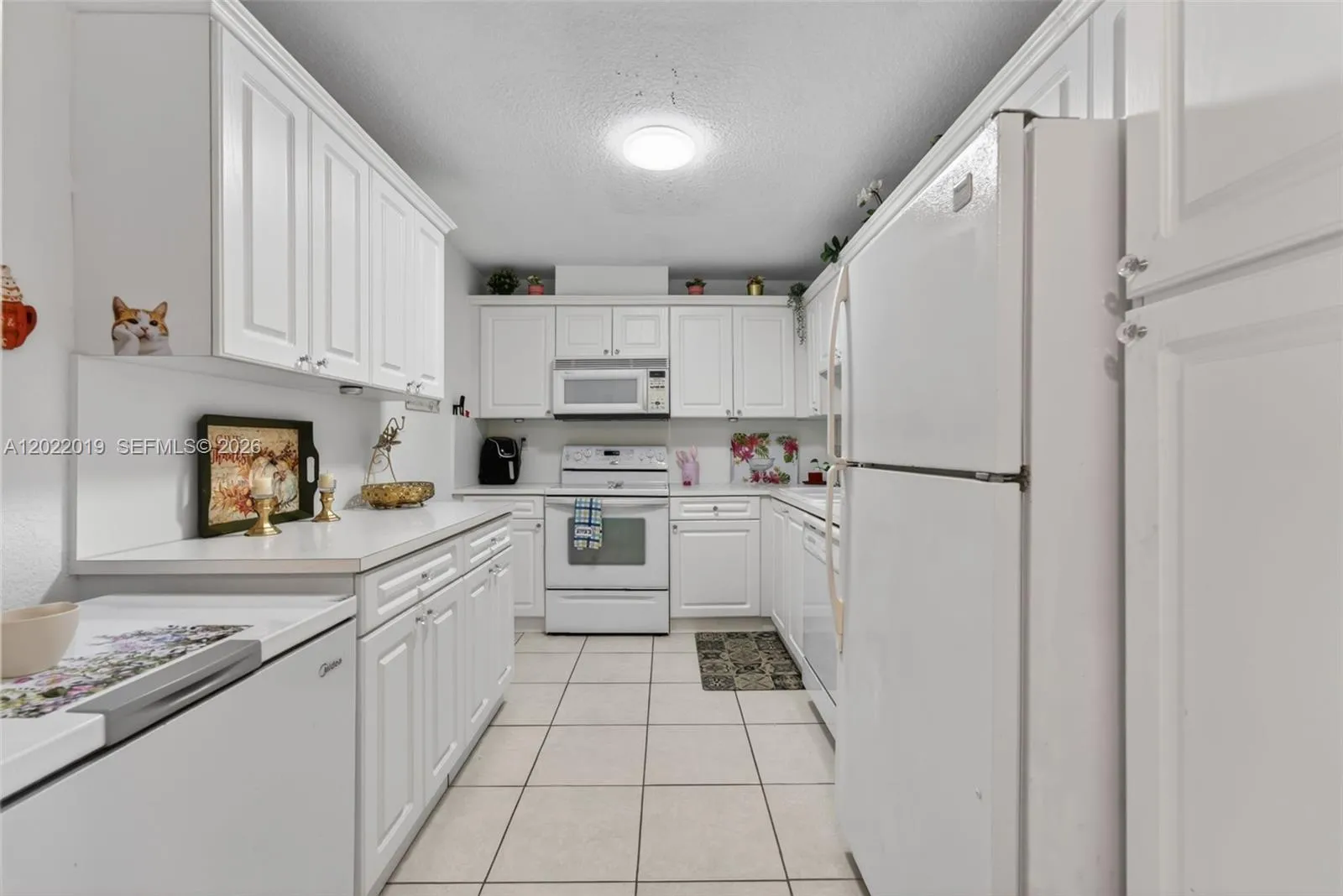 10777 W Sample Rd # 209, Coral Springs FL 33065
