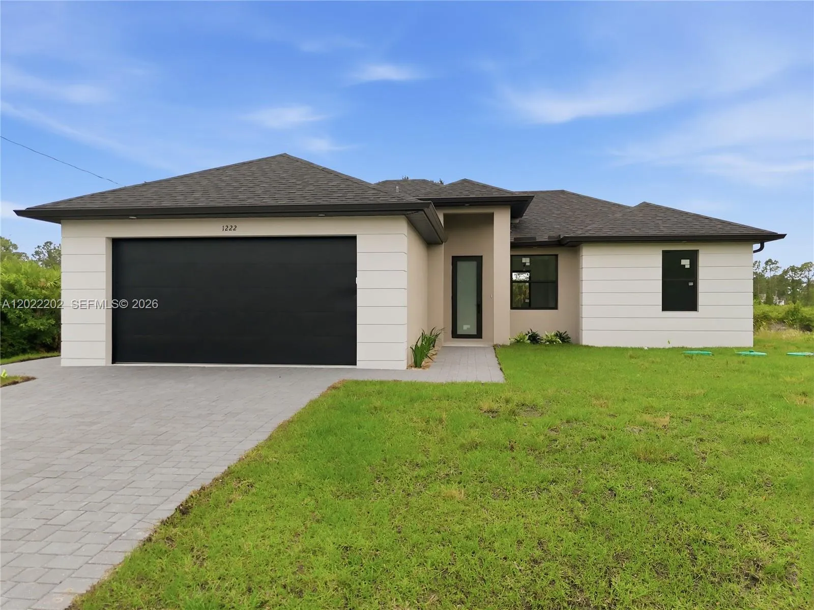 3 bedroom 2 bath for sale at 1222 Earnest St E, Lehigh Acres FL 33974
