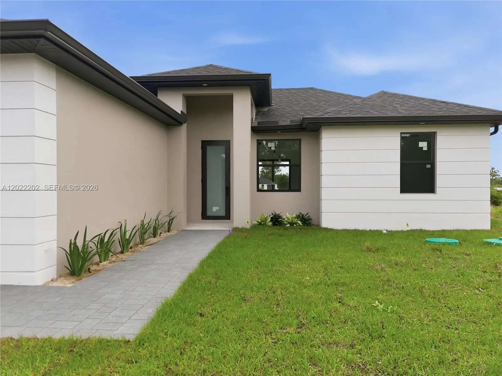 1222 Earnest St E, Lehigh Acres FL 33974