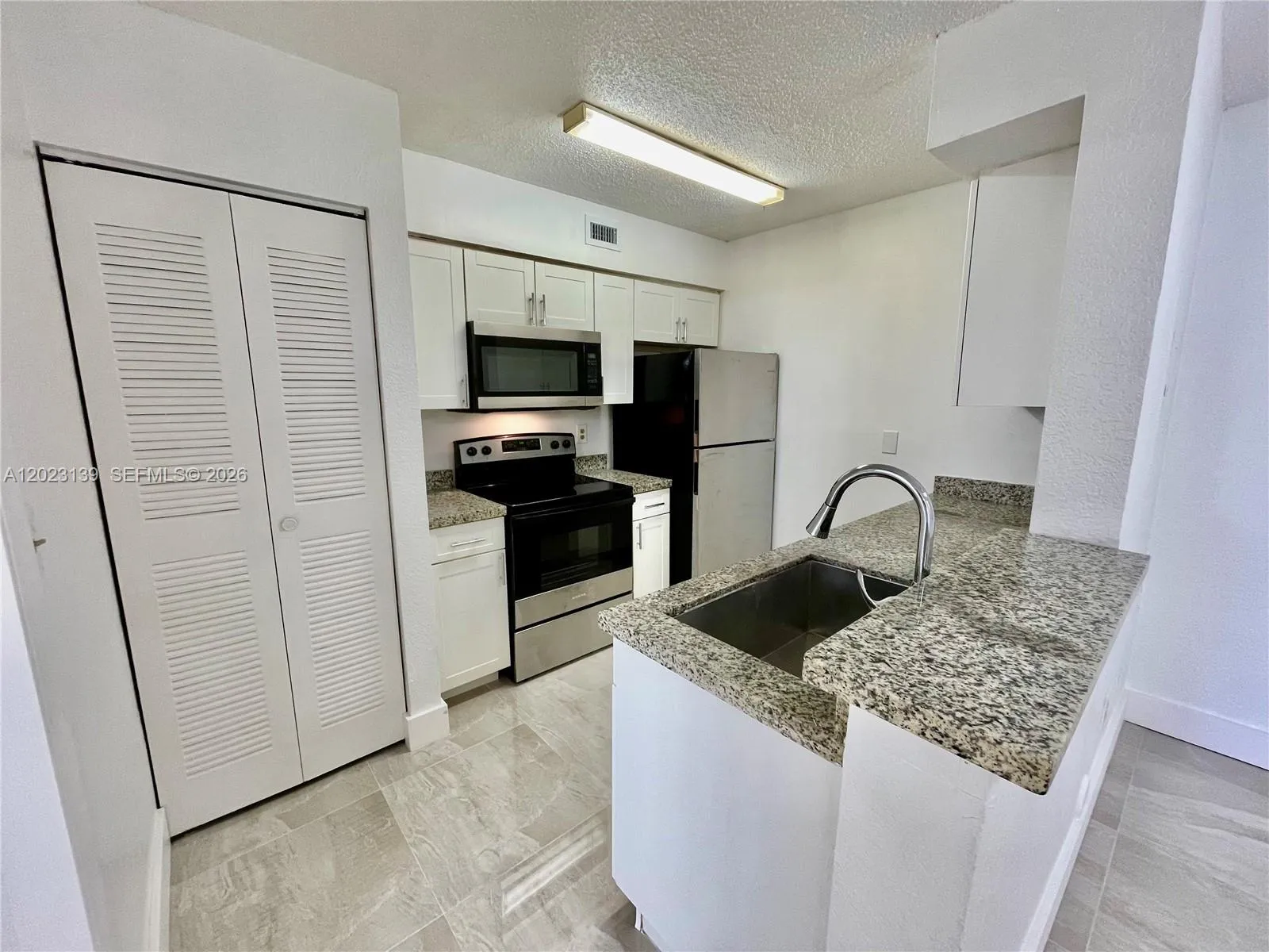 2880 N Oakland Forest Dr # 103, Oakland Park FL 33309