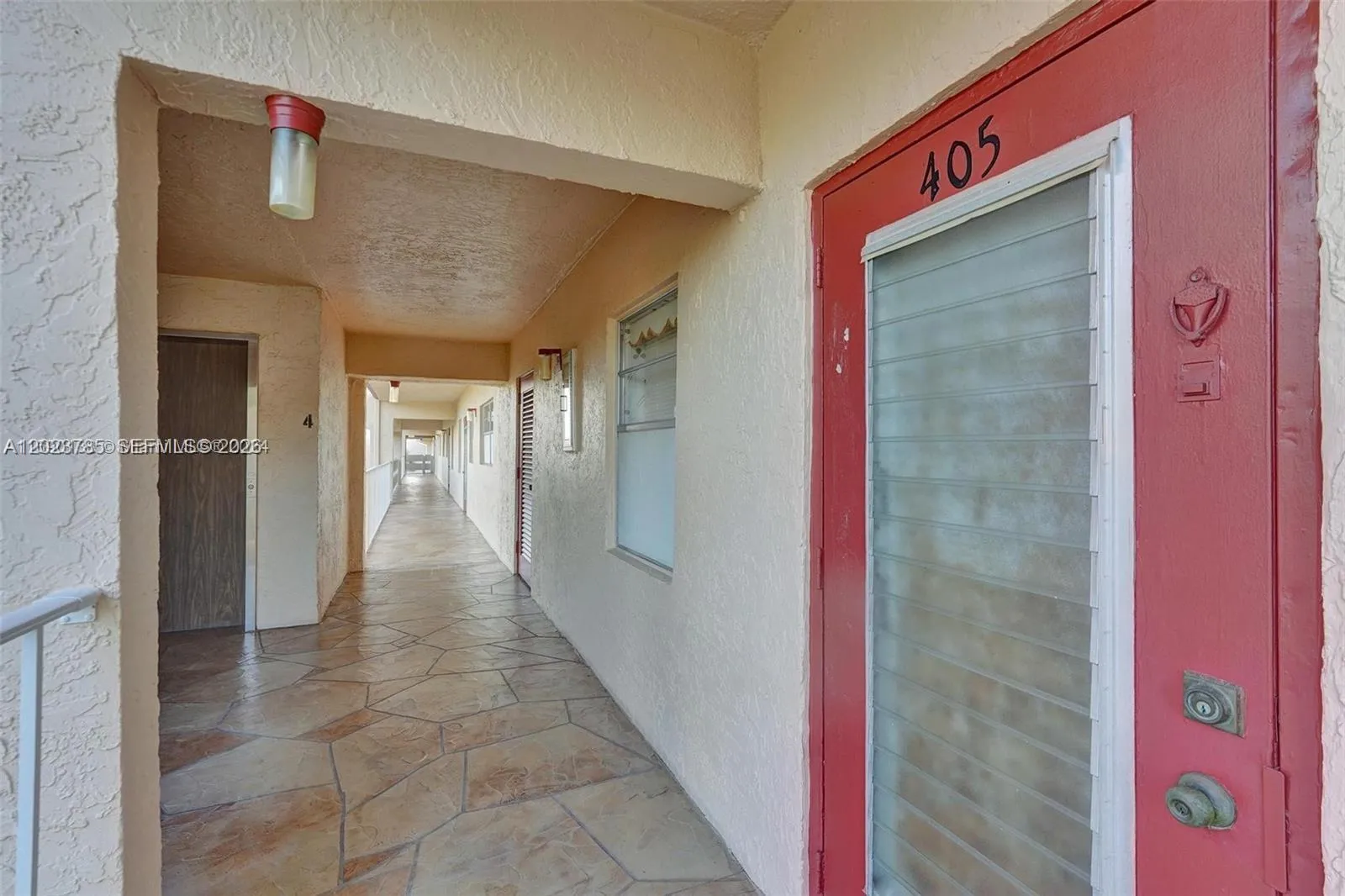 1 bedroom 1 bath for sale at 1030 Country Club Dr # 405, Margate FL 33063
