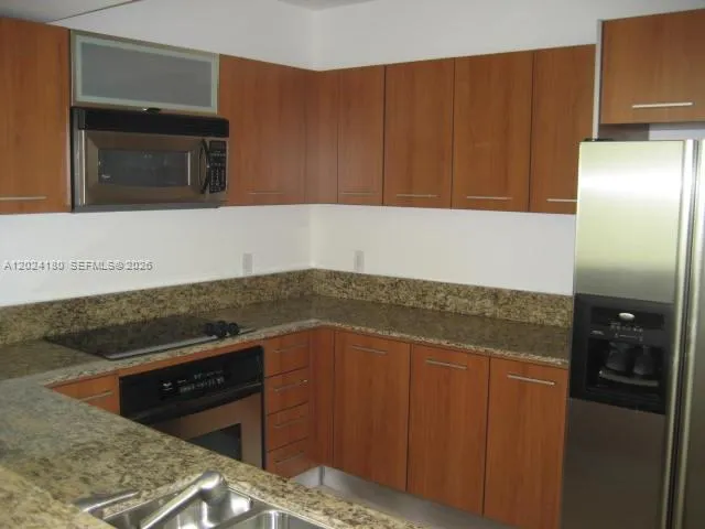 9066 SW 73 CT # 1702, Miami FL 33156