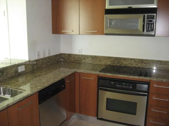 9066 SW 73 CT # 1702, Miami FL 33156