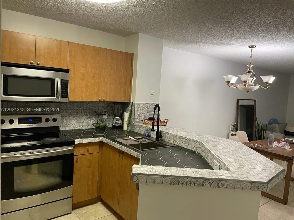 8750 N Sherman Cir # 208, Miramar FL 33025
