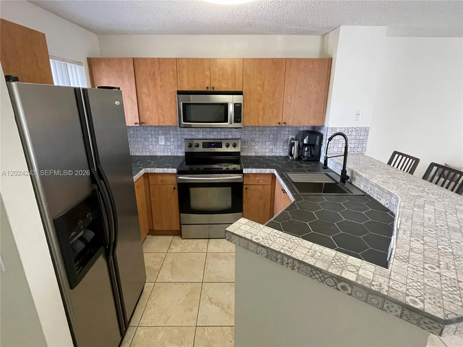 8750 N Sherman Cir # 208, Miramar FL 33025