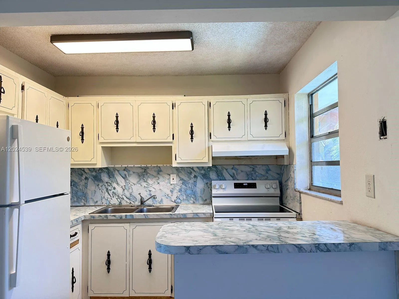 365 NE 125th St # 306, North Miami FL 33161